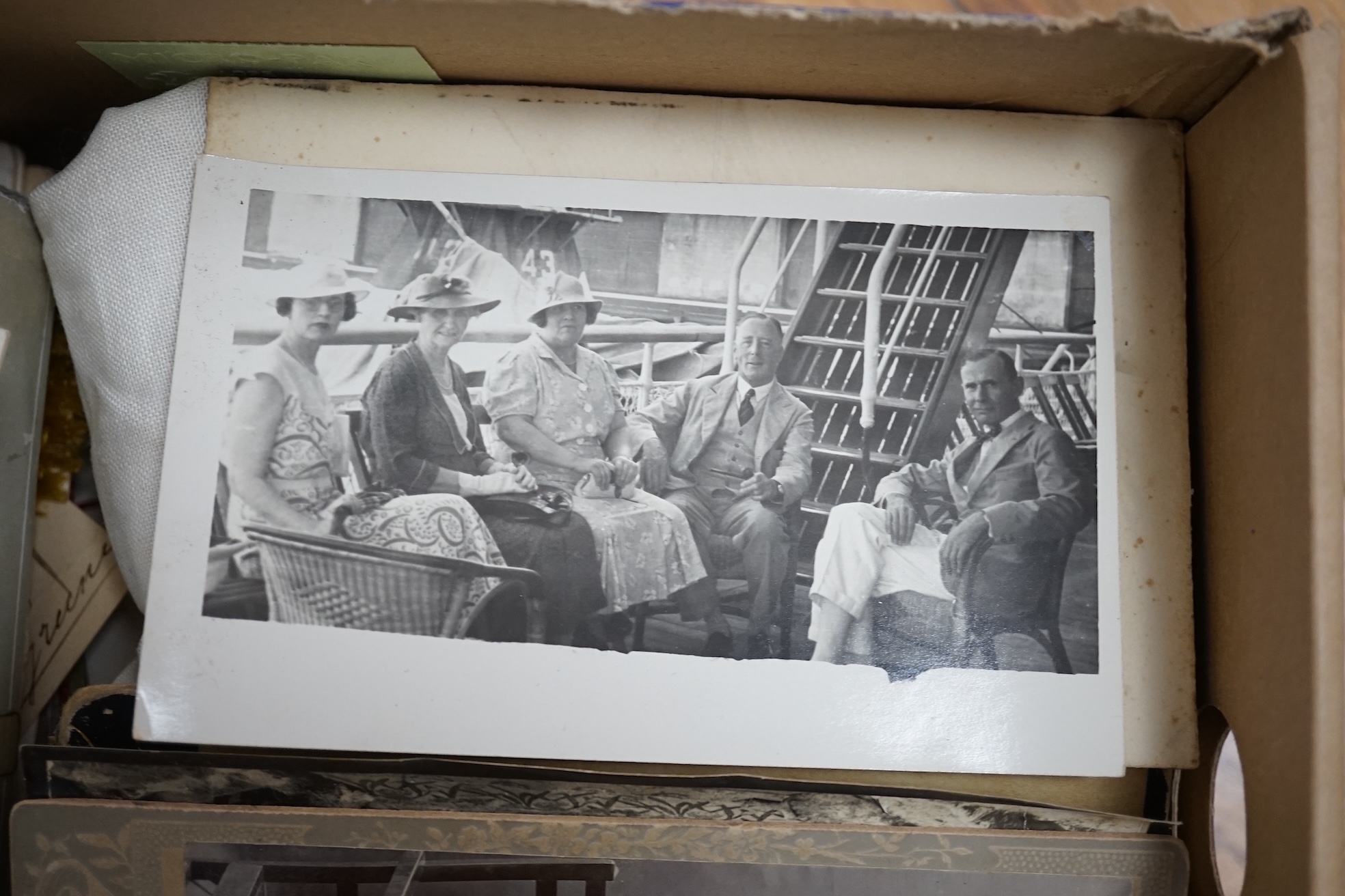 Two postcard albums, mostly topographical and other ephemera to include some black and white photographs. Condition - fair